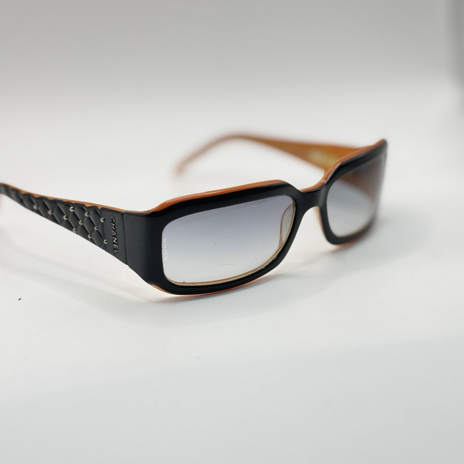 Authentic CHANEL Quilted Stud Rectangular Sunglas… - image 1