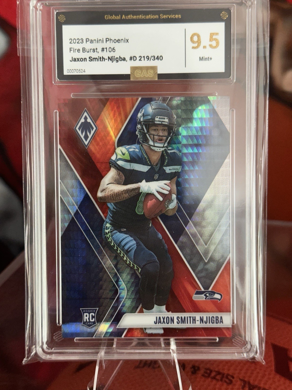 2023 Panini Phoenix - Rookies Jaxon Smith-Njigba #106 Fire Burst 219/340 (RC)