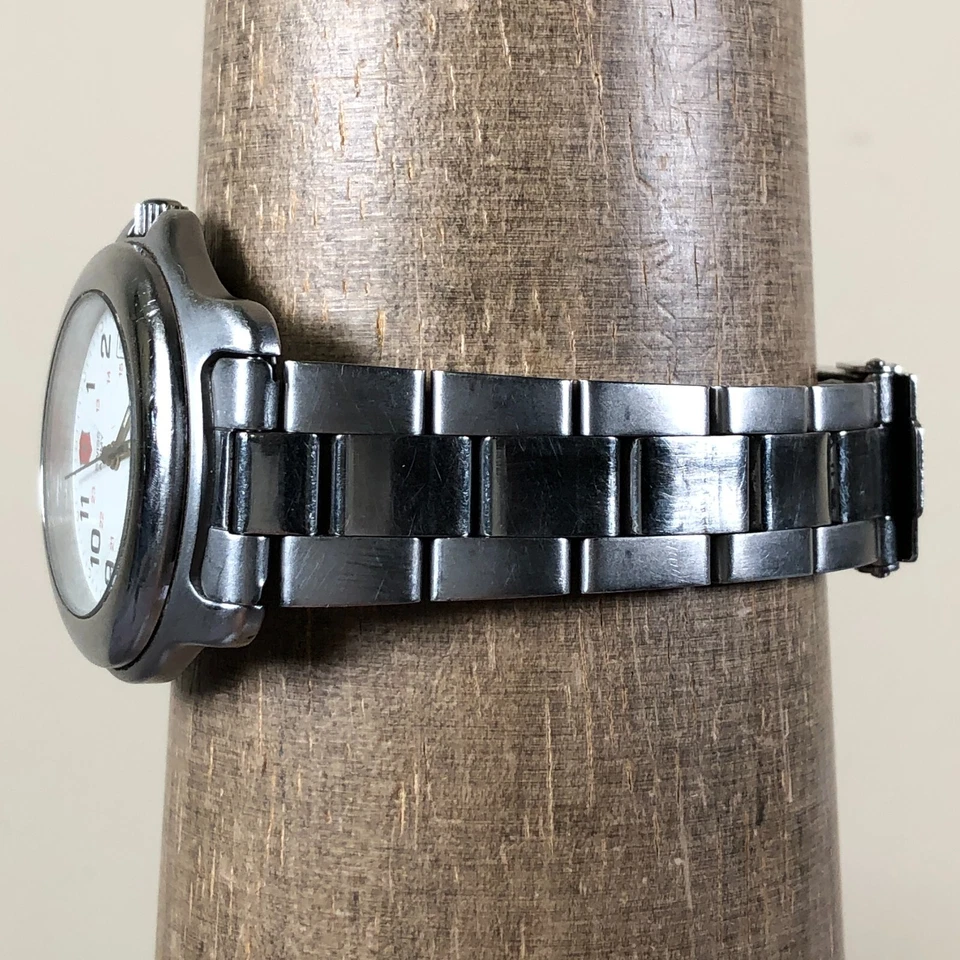 Reloj De Colección Victorinox Ejército Suizo Hombres Oficiales Fecha Tono Plateado Cuarzo 34mm 7" Foto 3 de 4