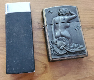 Lot of 2 lighters black stars Scripto & nude lady unbranded butane refills