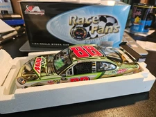 AUTOGRAPHED 2009 DALE EARNHART JR #88 MT DEW GOLD CHROME     1:24