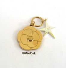 Chanel Gold Tone Key Charm -   Camellia New