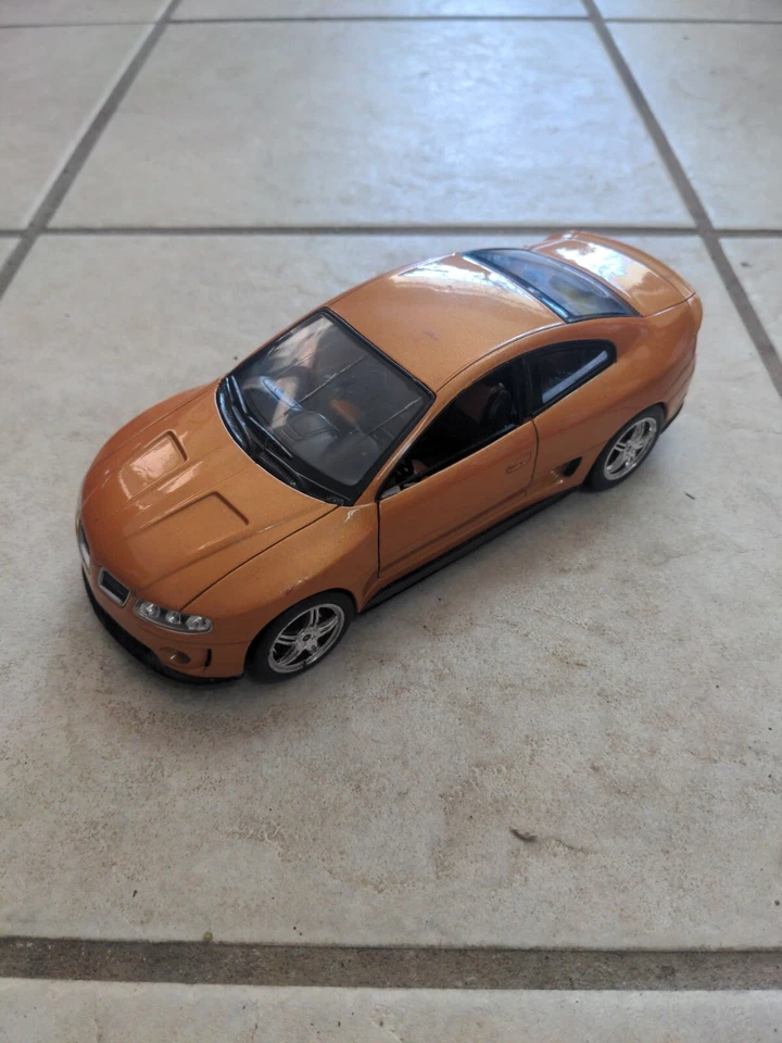Welly 2005 Pontiac GTO Ram Air 6 No. 22468 Orange 1/24 DieCast Car Used For Part - Image 3 of 4