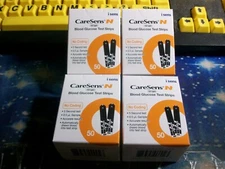 200 CARESENS N GLUCOSE TEST STRIPS,4 BOXES OF 50, EXP 4-26, GOOD SEALED BOXES
