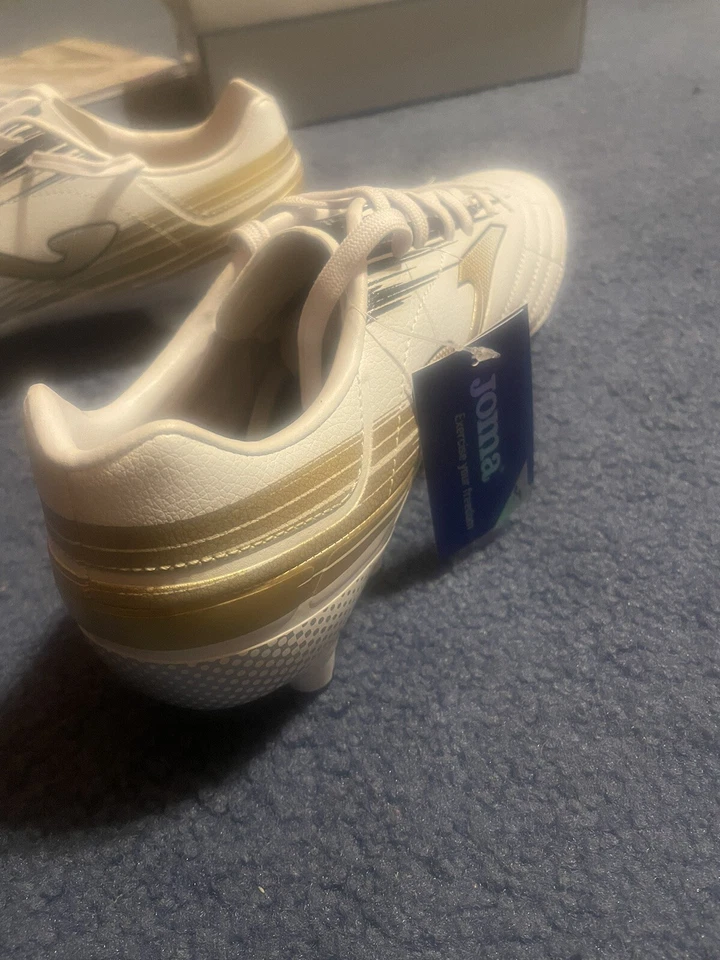 TACOS DE FUTBOL XPANDER 22 TIERRA FIRME FG ORO BLANCO Foto 4 de 4