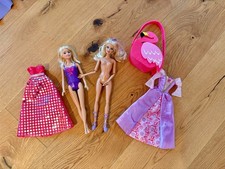 Bewegliche Barbie Puppe / Anziehpuppe und Klamotten  