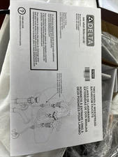 Delta Model 107687 Two Handle Widespread Bathroom Faucet.  New