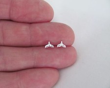 Rhodium plated sterling silver 4mm whale tail tiny post stud earrings.
