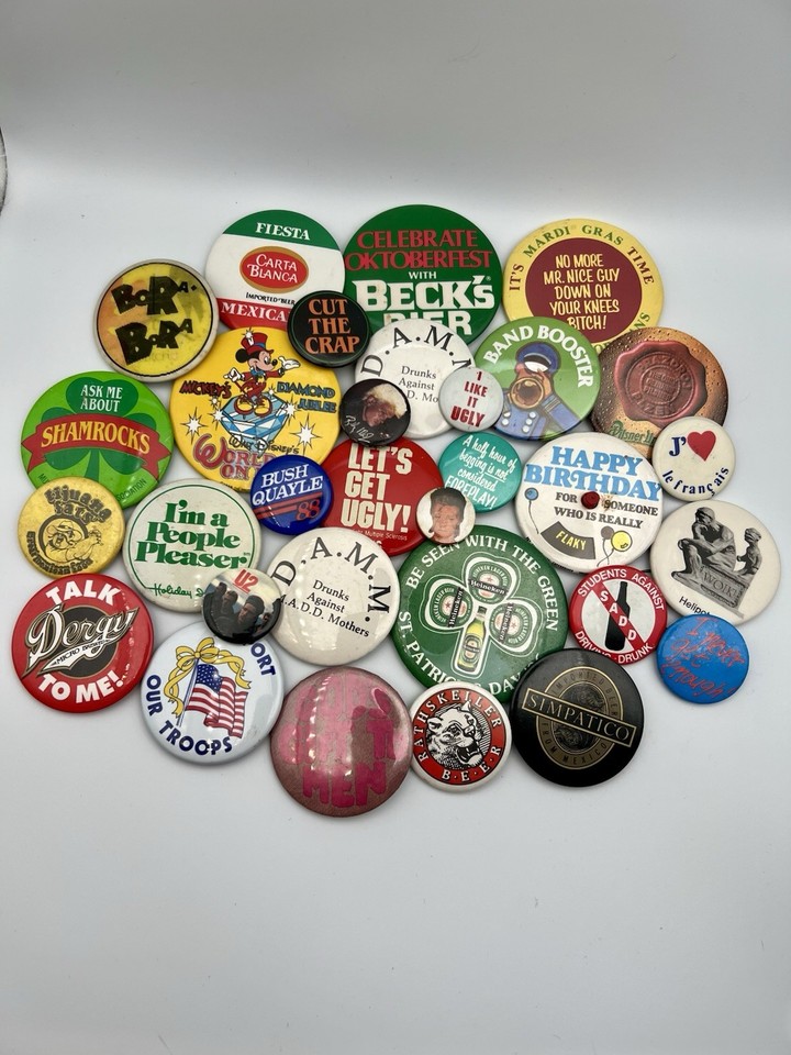 A curated lot of retro sarcastic pinback buttons with a David Bowie connection — wearable humor straight from a thrift-store time capsule.