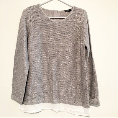 white sparkly sweater