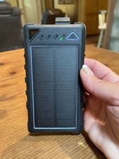 Compact Solar Charger Bank with LED Flashlight 10000mAH USB Port Camping