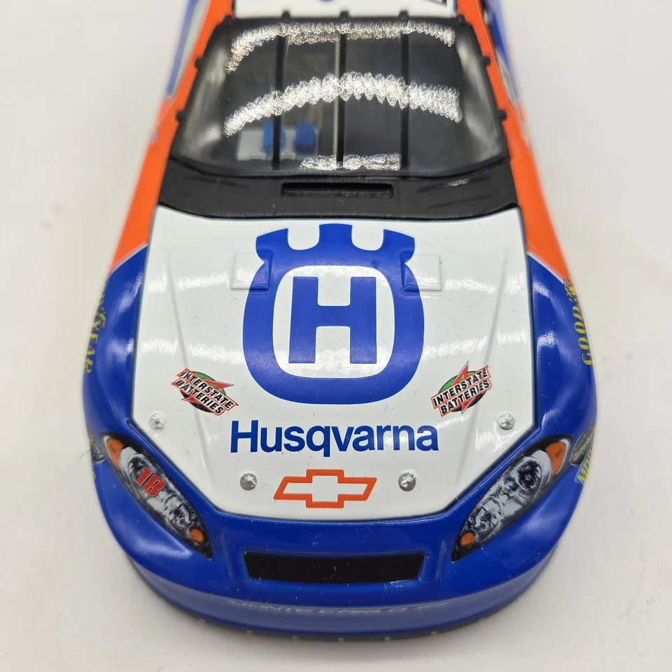 Motorsports Authentics #18 Husqvarna Chevy Monte Carlo SS – 1:24 NASCAR Diecast - Image 2 of 4