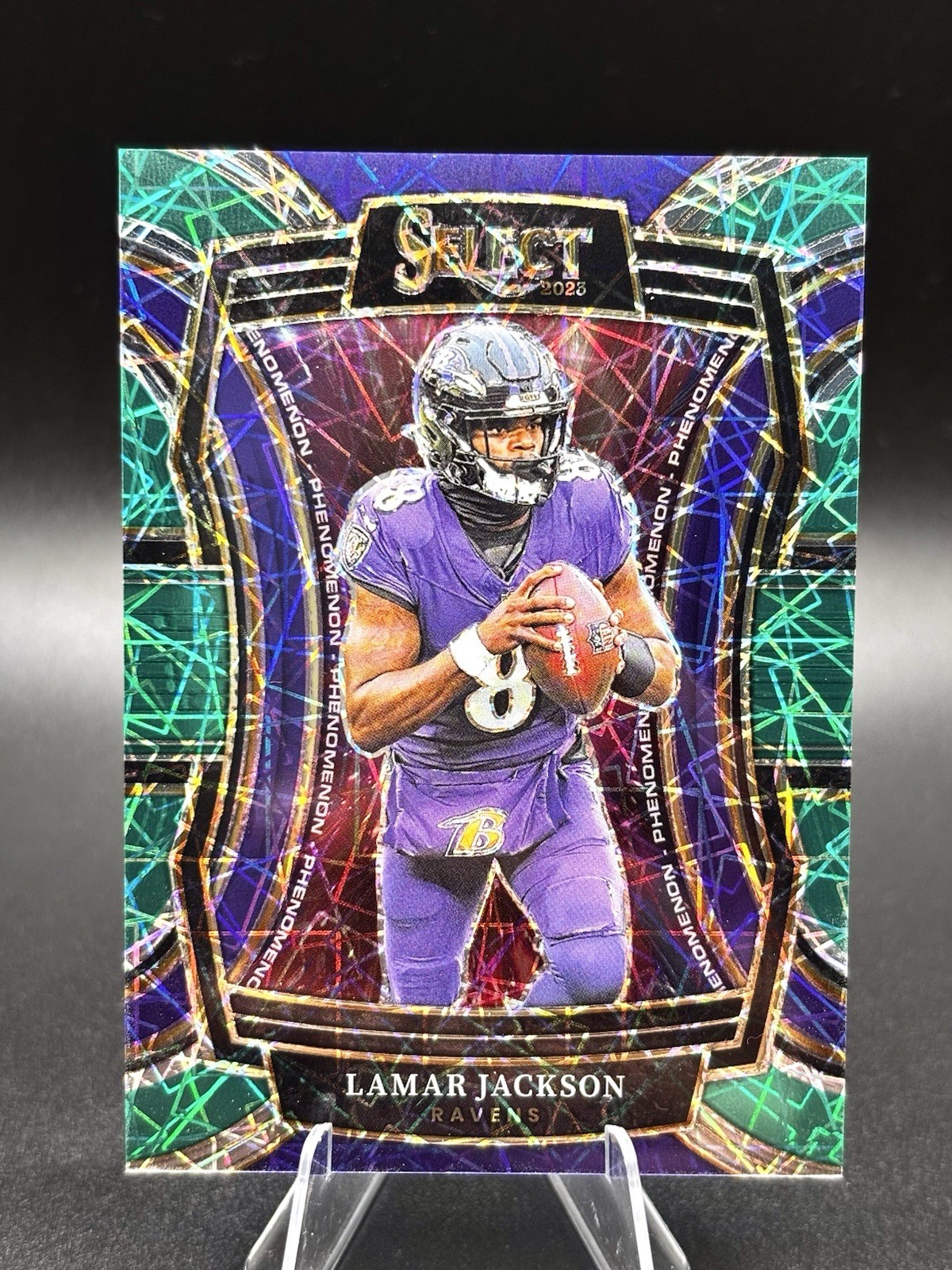 2023 Panini Select - Phenomenon Lamar Jackson #PH-LJA Green Lazer Prizm /5