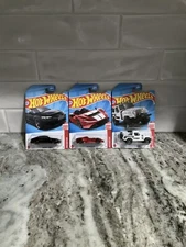Hot Wheels Red Edition Target Excl. x3 McLaren Elva & Jeepster Commando E-Tron