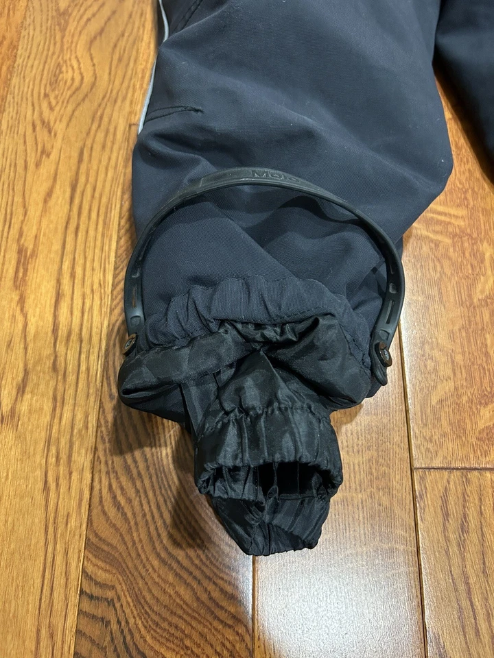 Pantalones de esquí/nieve MOLO para niños y niñas negros con estrellas blancas y forro polar talla 10 Foto 2 de 4