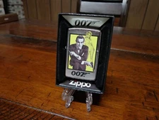 JAMES BOND 007 PISTOL WITH SILENCER AND BOND GIRL ZIPPO LIGHTER MINT IN BOX