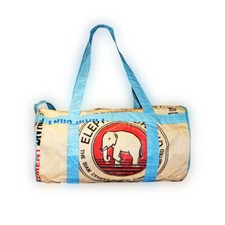 Holdall handmade from recycled cement bags in Cambodia sale donates school kit