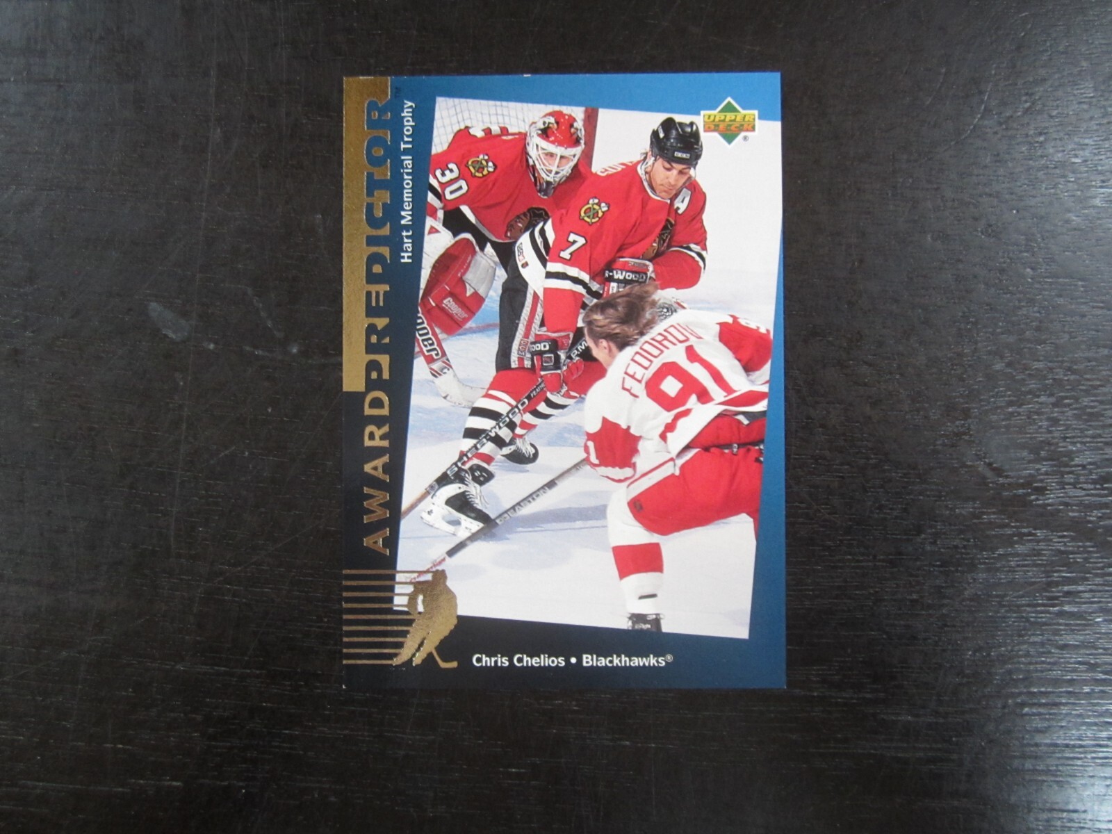 1994-95 Upper Deck Predictor Gold # H7 Chris Chelios (B75) Chicago Blackhawks