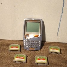 LeapFrog iQuest Handheld Learning System w/ 4 Cartridges Math Science SS Gr 6-8