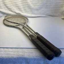 two vintage tennis racquets