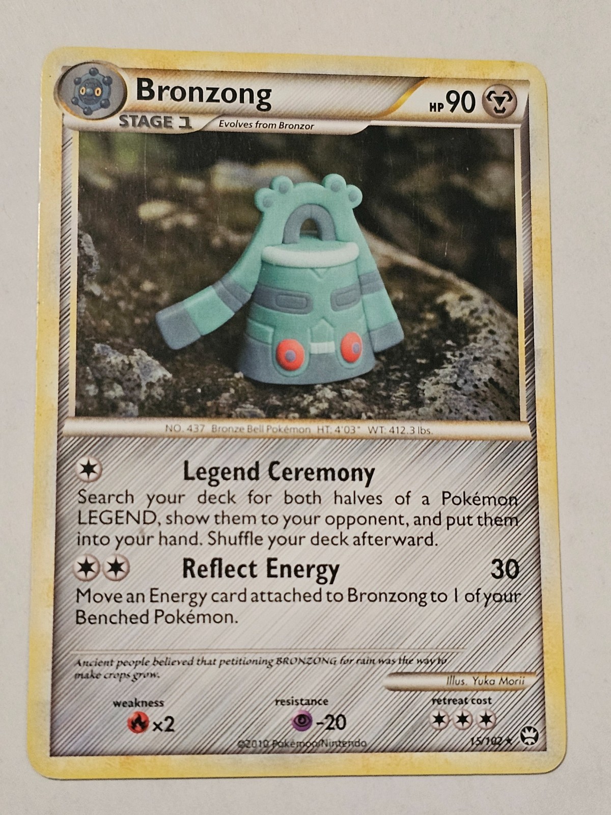 Bronzong 15/102, Regular LP, Triumphant Pokemon TCG