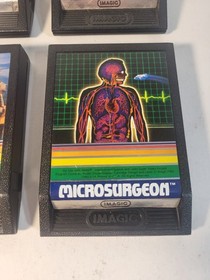 Lot of 4 Intellivision Game Cartridges - Demon, Atlantis, Beauty, Microsurgeon 