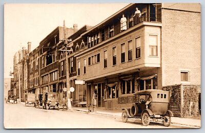 RPPC 2 Gals Stand on Balcony~2nd Story Extended Windows~Gasoline Pump~Main St