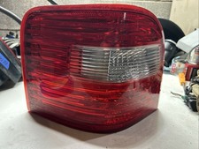 2005 - 2007 FORD FREESTYLE OEM LEFT DRIVER SIDE TAIL LIGHT BRAKE LIGHT NI PC