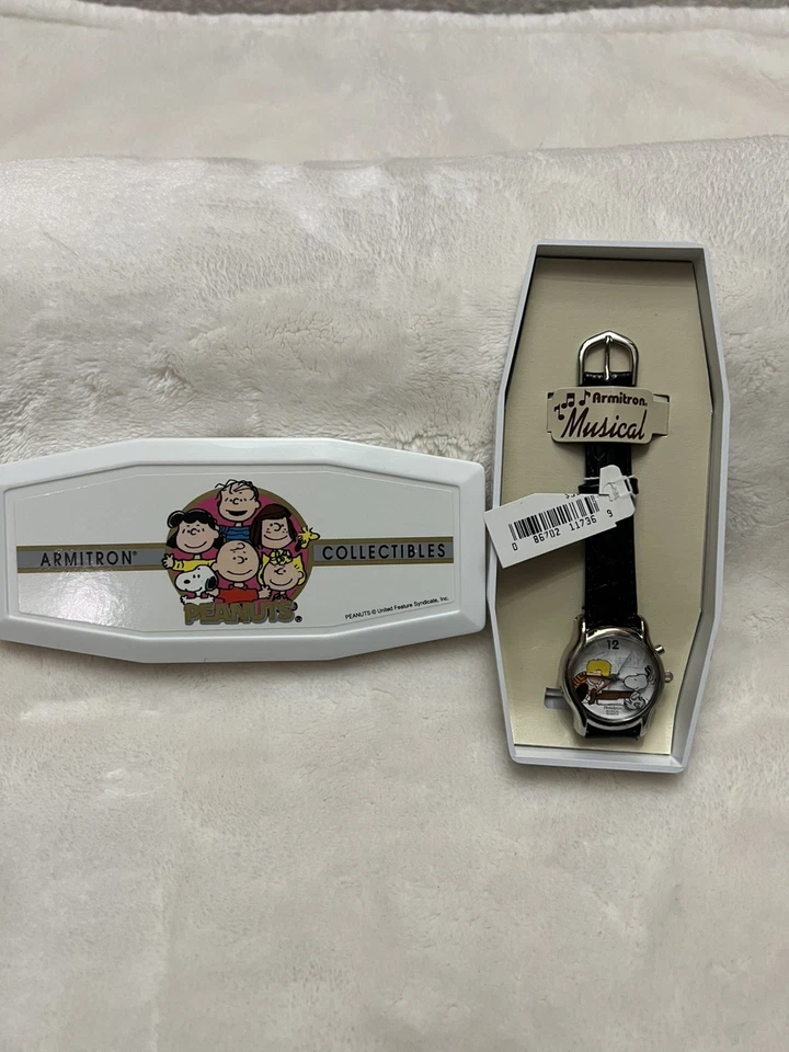 Reloj Musical Peanuts Snoopy & Linus de Armitron - Correa de Cuero Negro - Necesita batería Foto 3 de 4