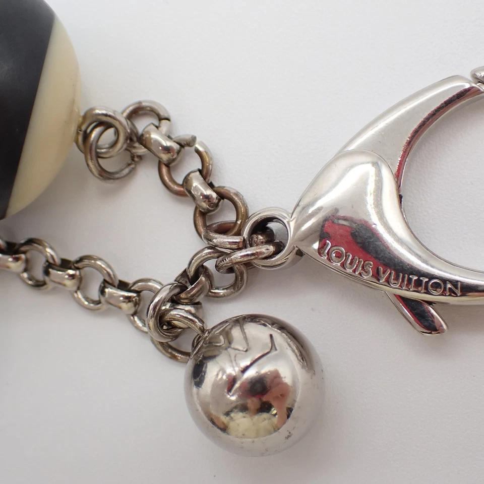 Подвеска для сумки LOUIS VUITTON с логотипом Bijoux Sac Mini Lin серебристая черная M65701 61KP112 - Изображение 3 из 4