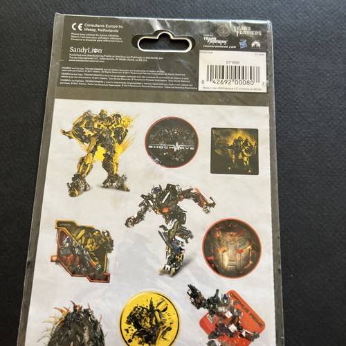 Set adesivi Hasbro 2011 con licenza Transformers Dark of the Moon Sandy Lion NOS - Foto 3 di 7