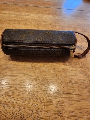 Louis Vuitton Mini Papillon Pouch, crafted from classic monogram canvas...