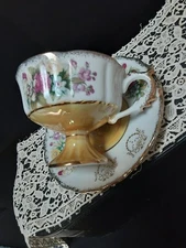 Enesco Yellow  Topaz Footed Cup Saucer Floral Roses Bouquet iridescent Vintage