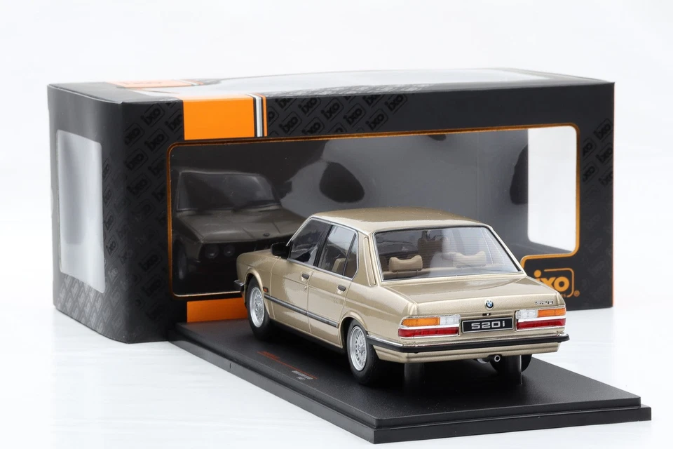 1:18 IXO BMW 5 Serie 520i E28 Berlina 1987 Metallico Oro 18CMC184 - Immagine 2 di 4
