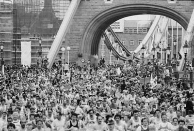 London Marathon runners crossing Tower Bridge over River Thames in- Old Photo