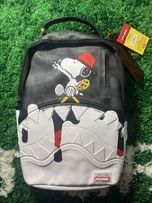 Sprayground x Snoopy Art Bite DLXSV Backpack ...