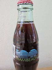 Bouteille en verre Coca Cola 8 oz. Neuf scellé Miami Beach 100 ans anniversaire rare