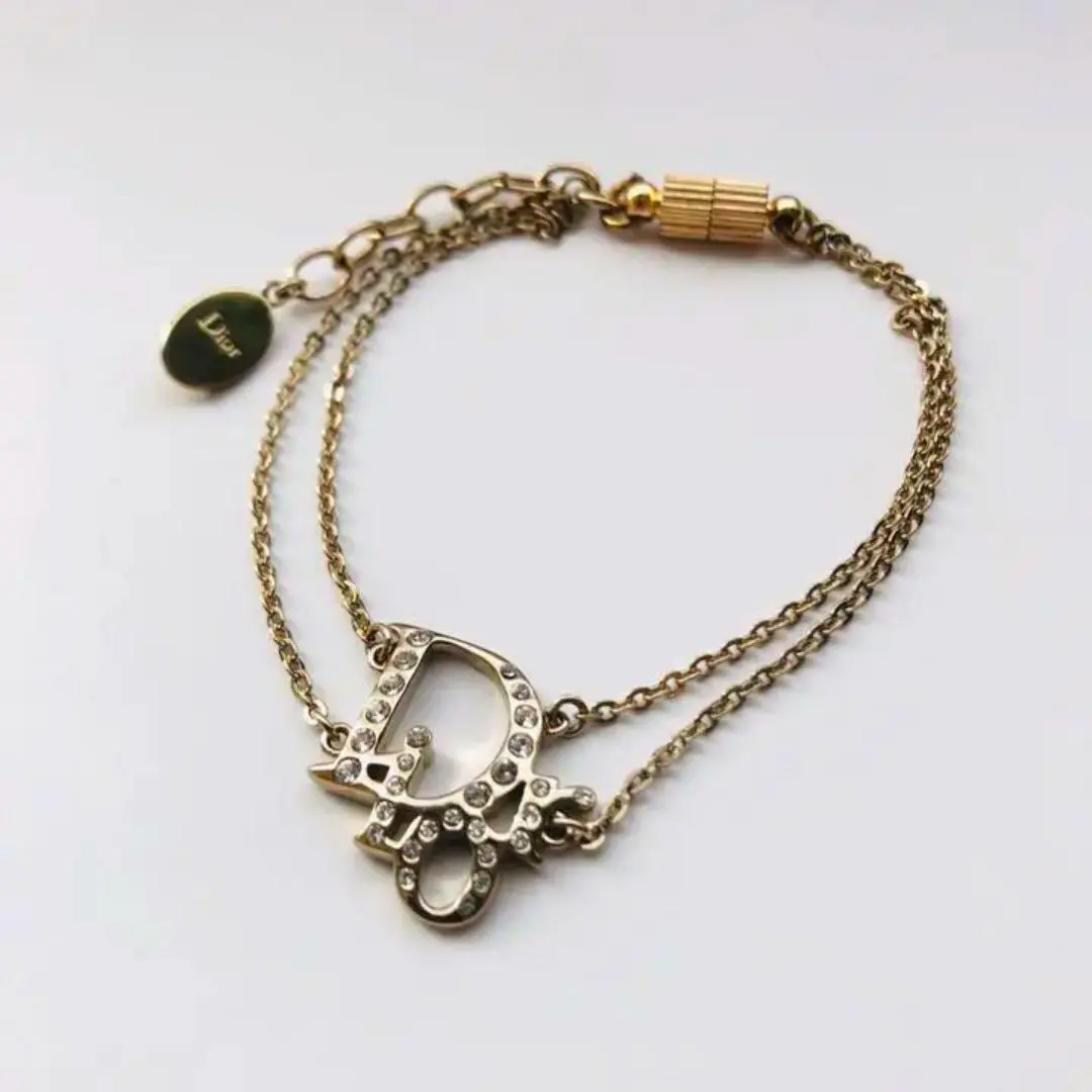 Christian Dior Bracelet Gold, Silver, Bronze boll bell 8.5cm Genuine with  Box | eBay