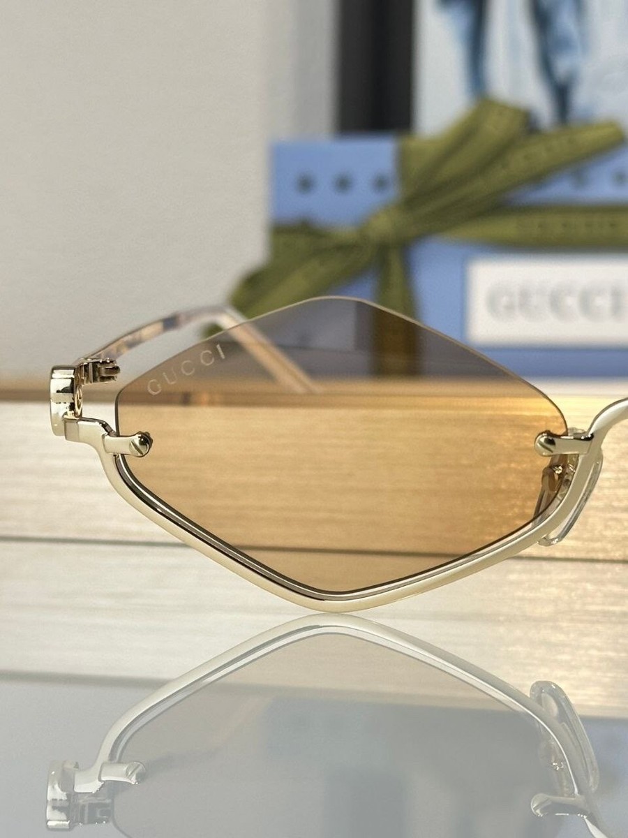 Gucci Women's Sunglasses – Rimless Geometric Shape, Gold Frame