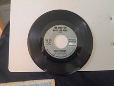 the turtles/The story of rock and roll/Cant you hear the cows the turtles/The story of rock and roll/Cant you hear the cows