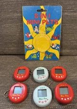 Lot 8 VTG 8 in 1 Mini Pets Blue Red Virtual Like Giga Pet Tamagotchi Toy AS IS