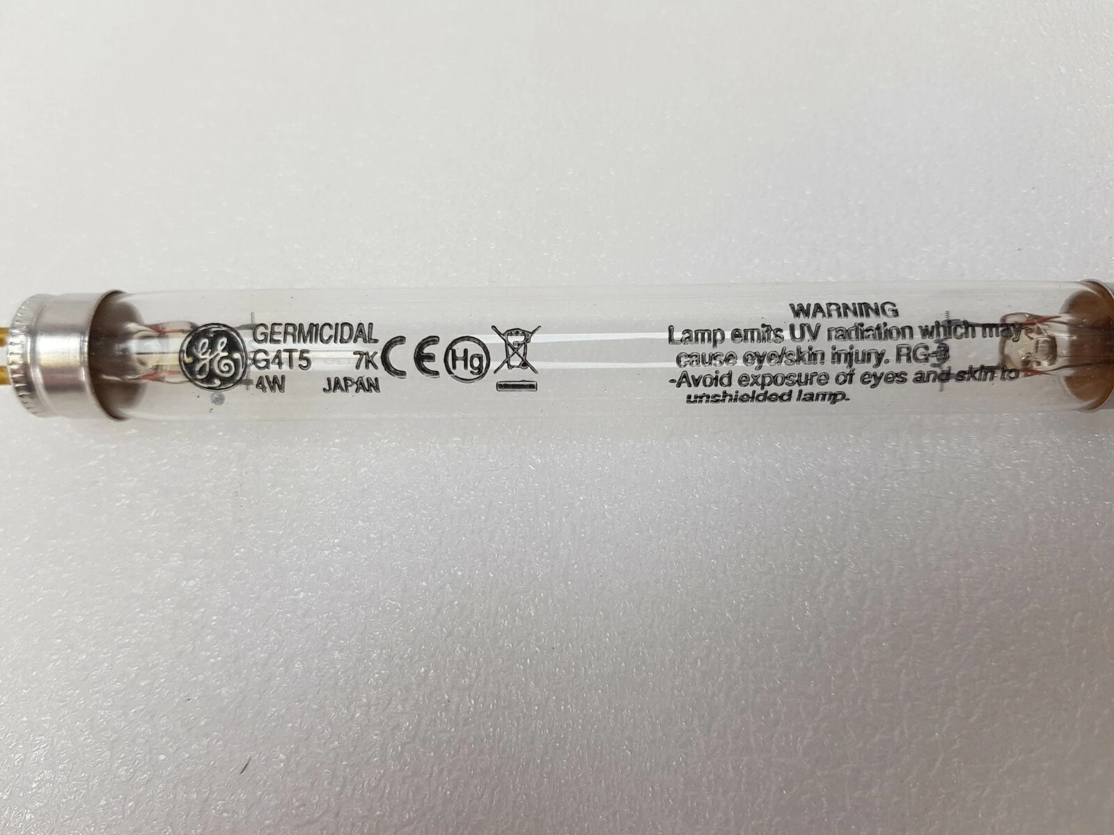 GE G4T5 lamp marking: Germicidal G4T5 4W Japan, CE, Hg, UV radiation warning RG-3