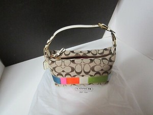 coach handle pouch signature bolsa