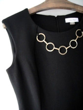 Calvin Klein Sz6 Black A Line Dress Gold Circle Accent Body Hugging Stretch Knit