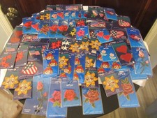 Lot of over 85 Vintage Appliques / Iron On Patches in original packaging
