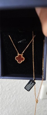Red four-leaf clover pendant made of agate and gold-plated silver