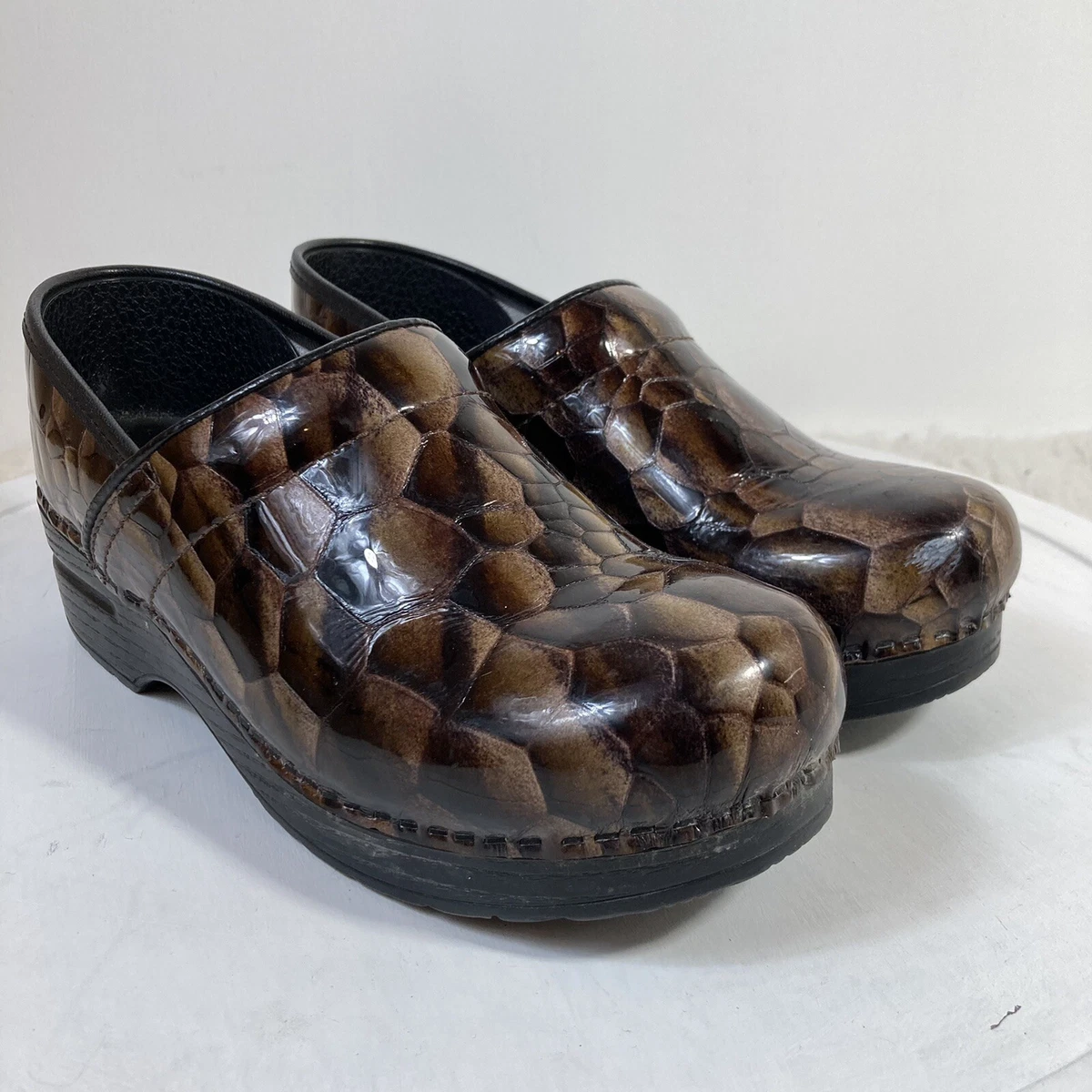 Dansko snake print clog clearance