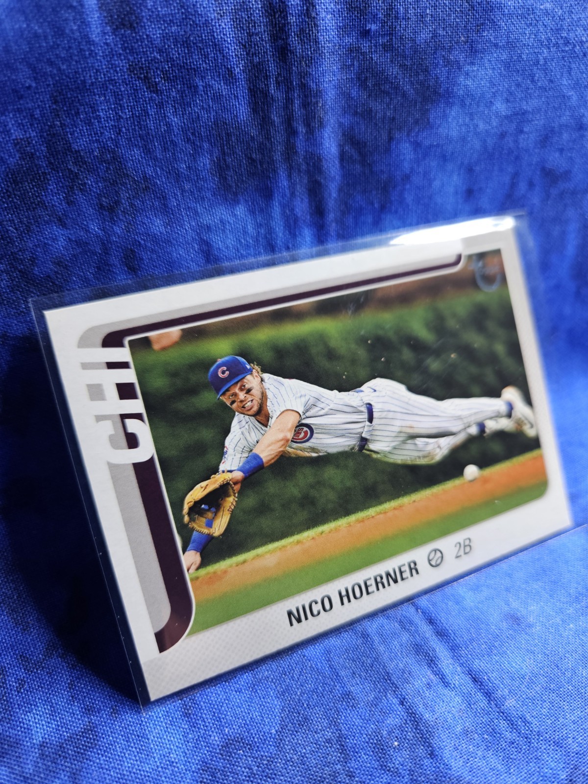 2025 Topps Series 1 Nico Hoerner Vintage Stock 57/99 #38 Chicago Cubs