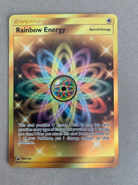 Pokemon 2018 RAINBOW ENERGY Sun & Moon Celestial Storm Rare Gold Holo 183/168