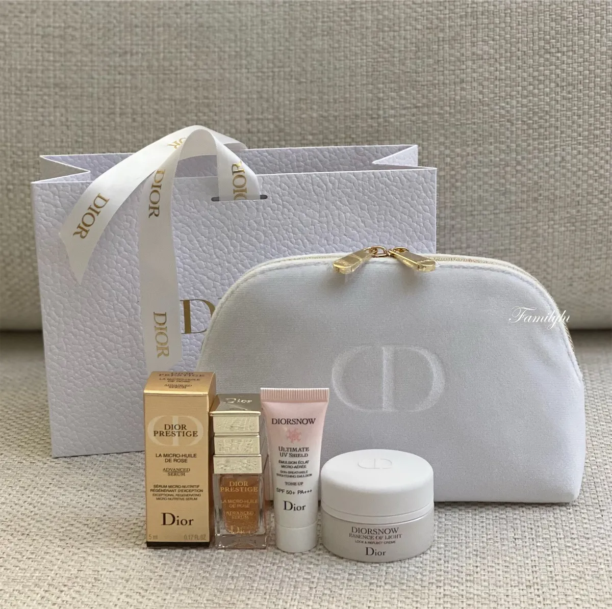 Dior Cosmetic Makeup Bag with Diorsnow Cream, Emulsion, Prestige Advanced  Serum